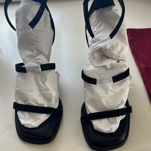 Tamara Mellon reverse wedge in black suede. Brand new never worn